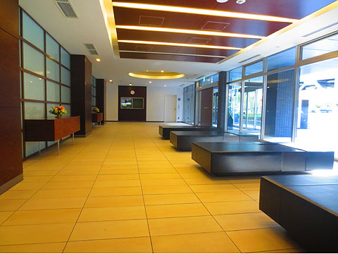 ロビー 丸い折上天井と間接照明で気品と格調を感じさせるエント