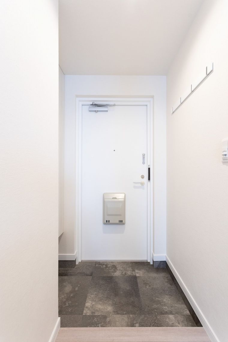 ロイヤルクリスタル井口玄関